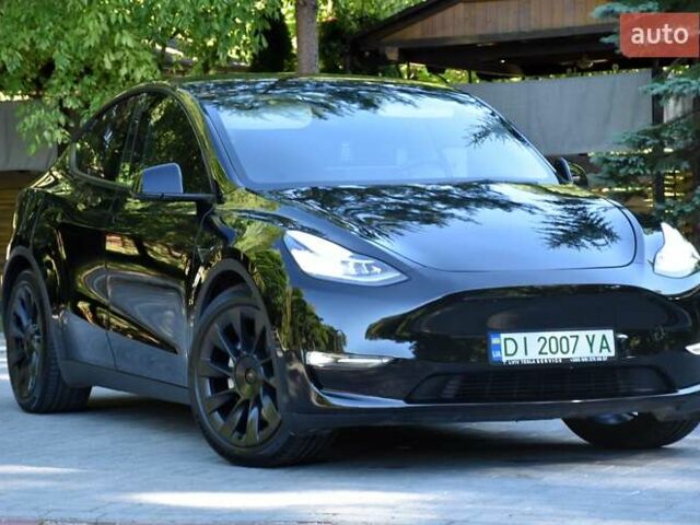 Черный Тесла Model Y, объемом двигателя 0 л и пробегом 82 тыс. км за 24950 $, фото 2 на Automoto.ua
