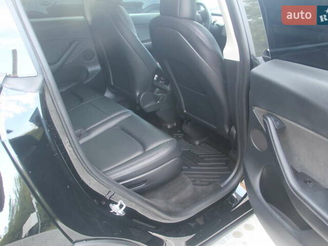 Черный Тесла Model Y, объемом двигателя 0 л и пробегом 56 тыс. км за 27499 $, фото 14 на Automoto.ua