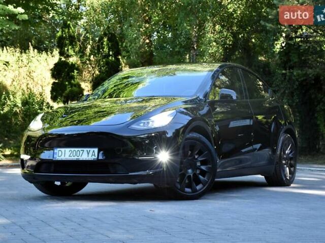 Черный Тесла Model Y, объемом двигателя 0 л и пробегом 82 тыс. км за 24950 $, фото 1 на Automoto.ua