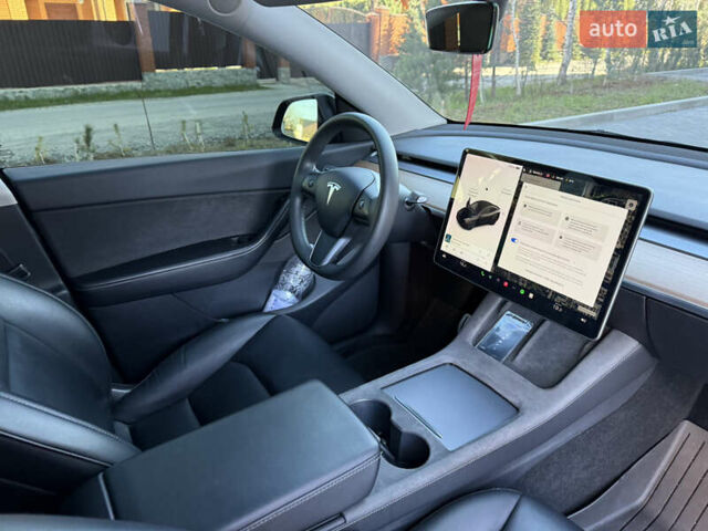 Черный Тесла Model Y, объемом двигателя 0 л и пробегом 68 тыс. км за 28500 $, фото 129 на Automoto.ua