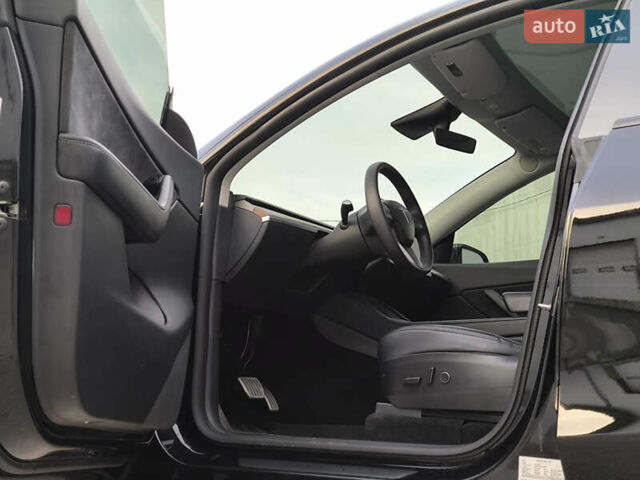 Черный Тесла Model Y, объемом двигателя 0 л и пробегом 57 тыс. км за 23950 $, фото 25 на Automoto.ua