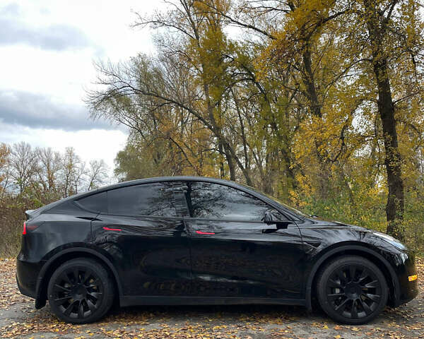 Черный Тесла Model Y, объемом двигателя 0 л и пробегом 158 тыс. км за 22000 $, фото 1 на Automoto.ua