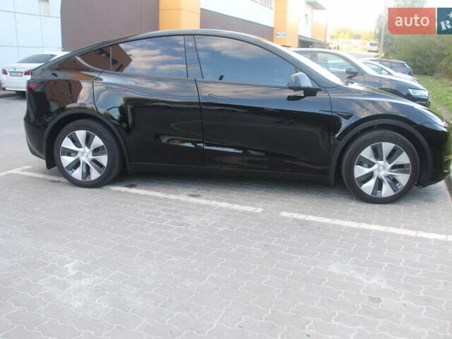 Черный Тесла Model Y, объемом двигателя 0 л и пробегом 56 тыс. км за 27499 $, фото 5 на Automoto.ua