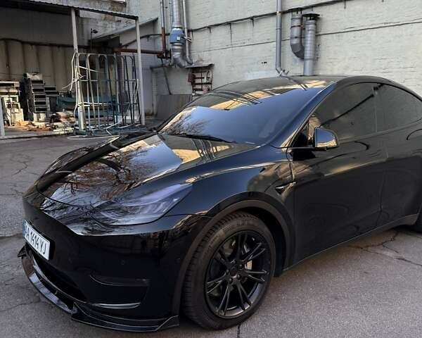 Черный Тесла Model Y, объемом двигателя 0 л и пробегом 59 тыс. км за 28999 $, фото 4 на Automoto.ua