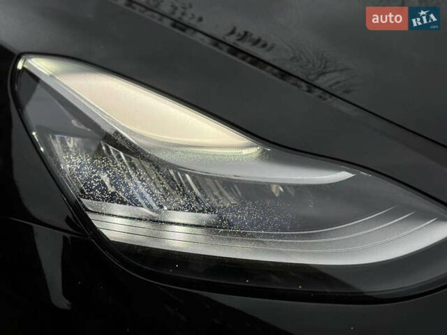 Черный Тесла Model Y, объемом двигателя 0 л и пробегом 82 тыс. км за 26000 $, фото 4 на Automoto.ua
