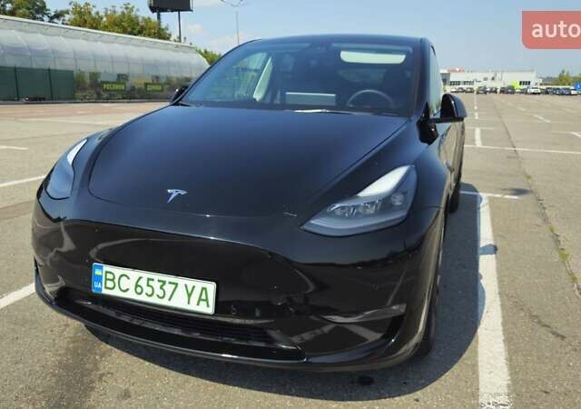 Черный Тесла Model Y, объемом двигателя 0 л и пробегом 99 тыс. км за 27000 $, фото 2 на Automoto.ua