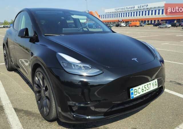 Черный Тесла Model Y, объемом двигателя 0 л и пробегом 99 тыс. км за 27000 $, фото 1 на Automoto.ua
