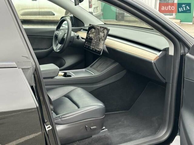 Черный Тесла Model Y, объемом двигателя 0 л и пробегом 127 тыс. км за 26990 $, фото 24 на Automoto.ua
