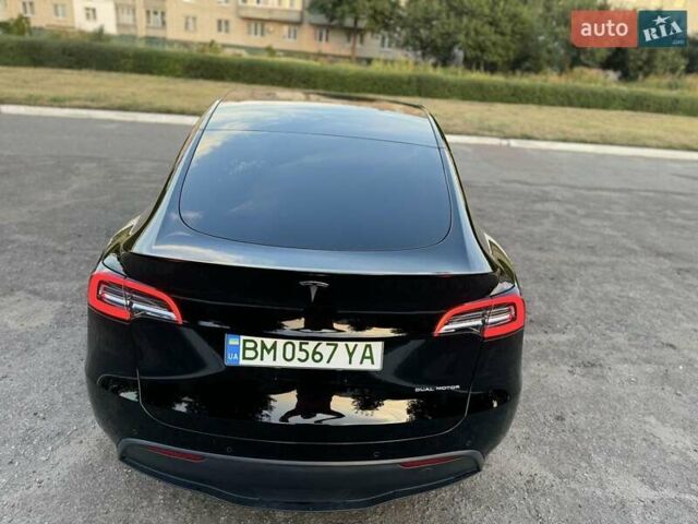 Черный Тесла Model Y, объемом двигателя 0 л и пробегом 101 тыс. км за 23999 $, фото 1 на Automoto.ua