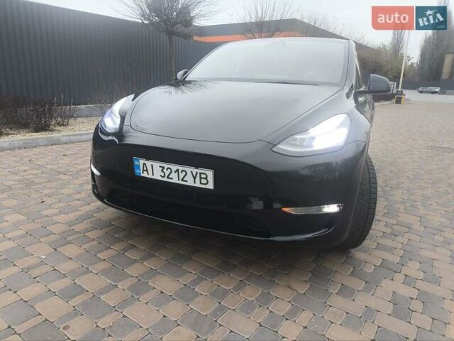 Чорний Тесла Model Y, об'ємом двигуна 0 л та пробігом 77 тис. км за 23900 $, фото 2 на Automoto.ua
