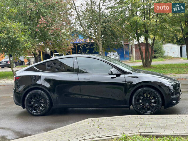 Черный Тесла Model Y, объемом двигателя 0 л и пробегом 82 тыс. км за 26000 $, фото 19 на Automoto.ua