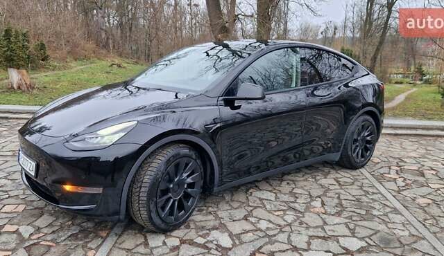 Чорний Тесла Model Y, об'ємом двигуна 0 л та пробігом 73 тис. км за 30300 $, фото 1 на Automoto.ua