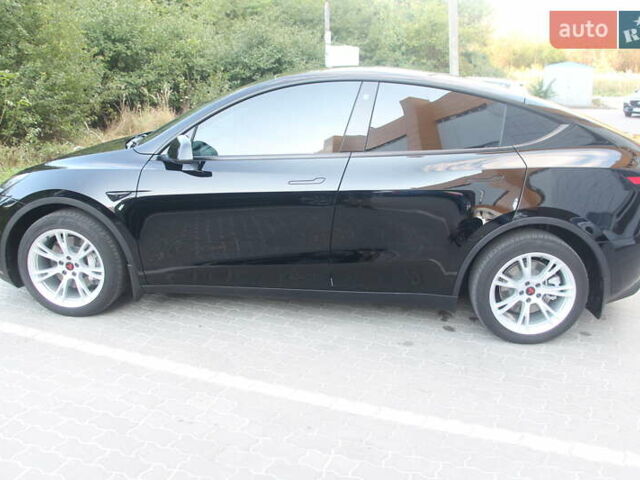 Черный Тесла Model Y, объемом двигателя 0 л и пробегом 56 тыс. км за 27499 $, фото 4 на Automoto.ua