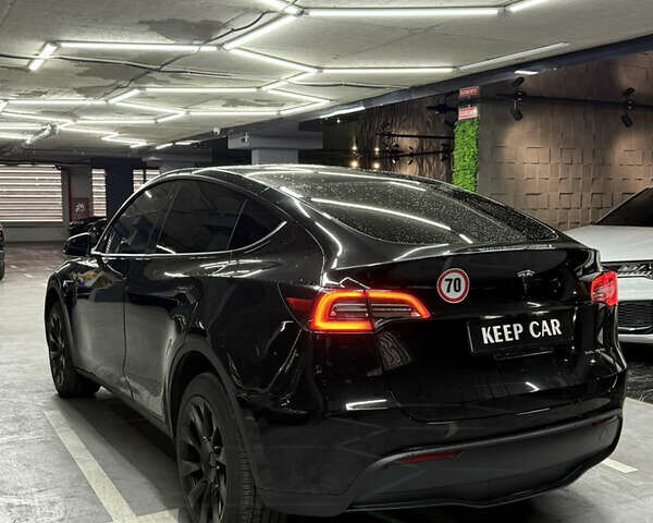 Черный Тесла Model Y, объемом двигателя 0 л и пробегом 124 тыс. км за 24900 $, фото 10 на Automoto.ua