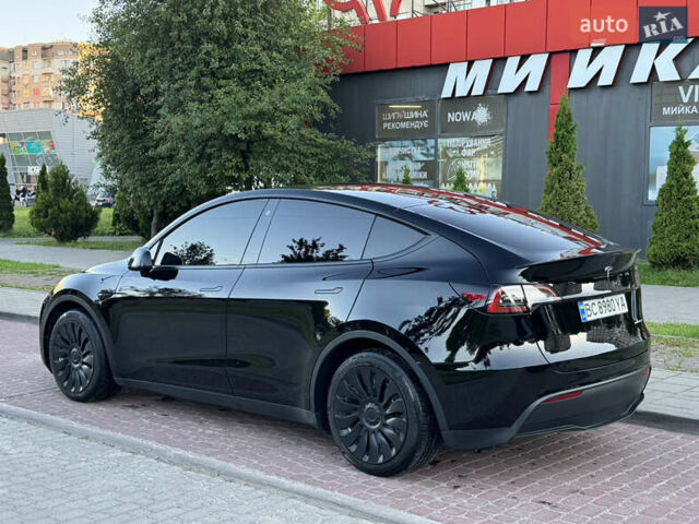 Черный Тесла Model Y, объемом двигателя 0 л и пробегом 102 тыс. км за 24999 $, фото 4 на Automoto.ua