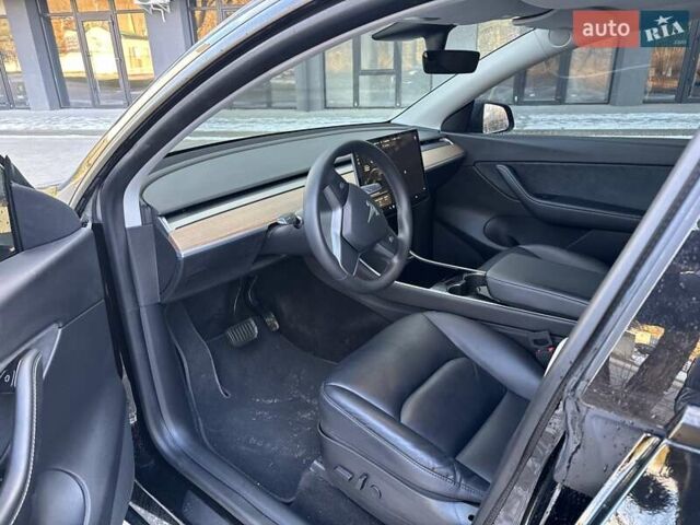 Черный Тесла Model Y, объемом двигателя 0 л и пробегом 59 тыс. км за 24900 $, фото 56 на Automoto.ua