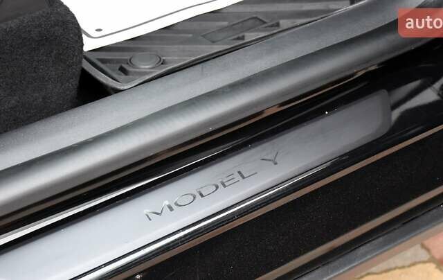 Черный Тесла Model Y, объемом двигателя 0 л и пробегом 73 тыс. км за 25950 $, фото 55 на Automoto.ua