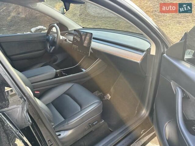 Черный Тесла Model Y, объемом двигателя 0 л и пробегом 59 тыс. км за 24900 $, фото 55 на Automoto.ua