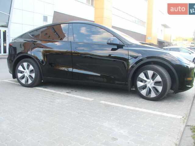 Черный Тесла Model Y, объемом двигателя 0 л и пробегом 56 тыс. км за 27499 $, фото 6 на Automoto.ua