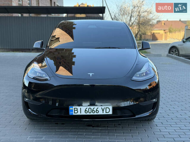 Черный Тесла Model Y, объемом двигателя 0 л и пробегом 68 тыс. км за 28500 $, фото 1 на Automoto.ua