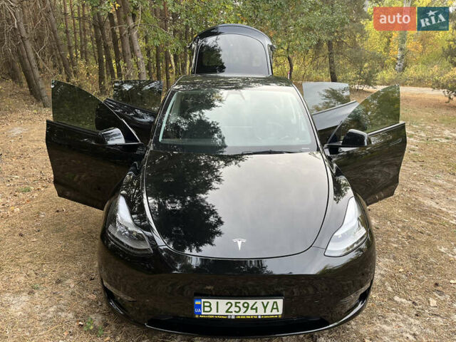 Черный Тесла Model Y, объемом двигателя 0 л и пробегом 125 тыс. км за 24400 $, фото 23 на Automoto.ua