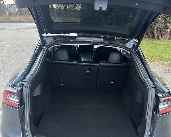 Черный Тесла Model Y, объемом двигателя 0 л и пробегом 66 тыс. км за 24950 $, фото 9 на Automoto.ua