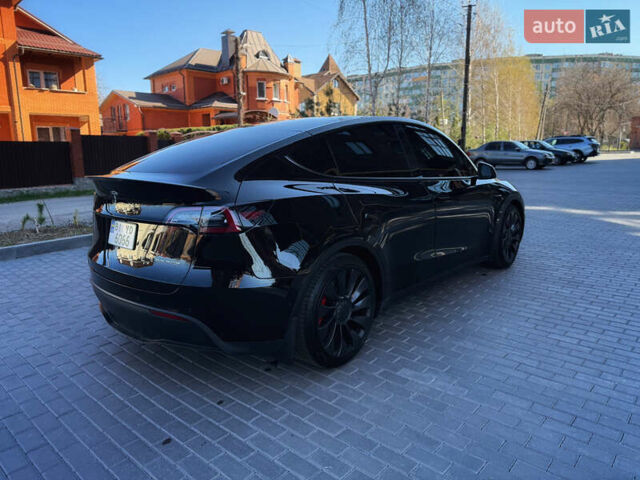 Черный Тесла Model Y, объемом двигателя 0 л и пробегом 68 тыс. км за 28500 $, фото 136 на Automoto.ua