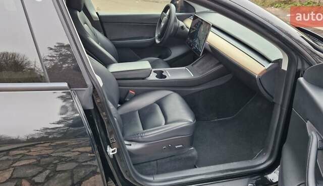 Чорний Тесла Model Y, об'ємом двигуна 0 л та пробігом 73 тис. км за 30300 $, фото 16 на Automoto.ua