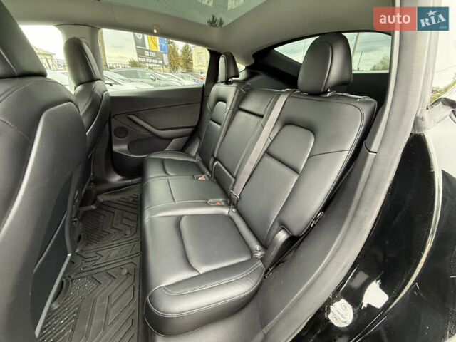 Чорний Тесла Model Y, об'ємом двигуна 0 л та пробігом 62 тис. км за 24999 $, фото 48 на Automoto.ua