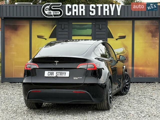 Чорний Тесла Model Y, об'ємом двигуна 0 л та пробігом 62 тис. км за 24999 $, фото 2 на Automoto.ua