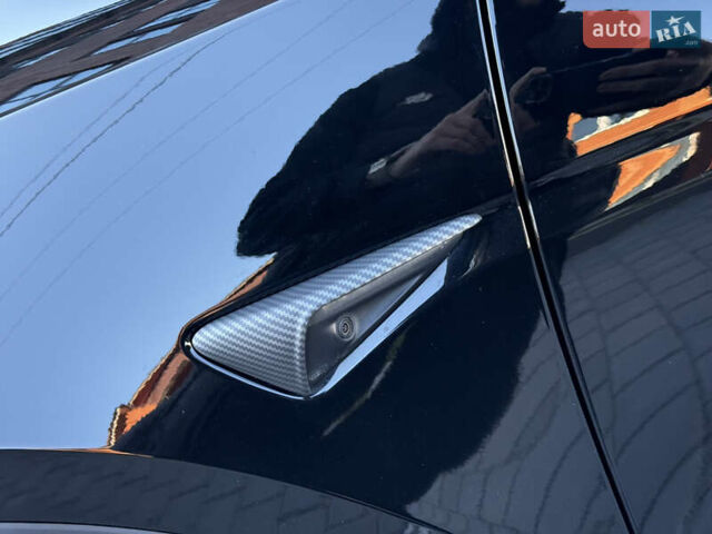 Черный Тесла Model Y, объемом двигателя 0 л и пробегом 68 тыс. км за 28500 $, фото 83 на Automoto.ua
