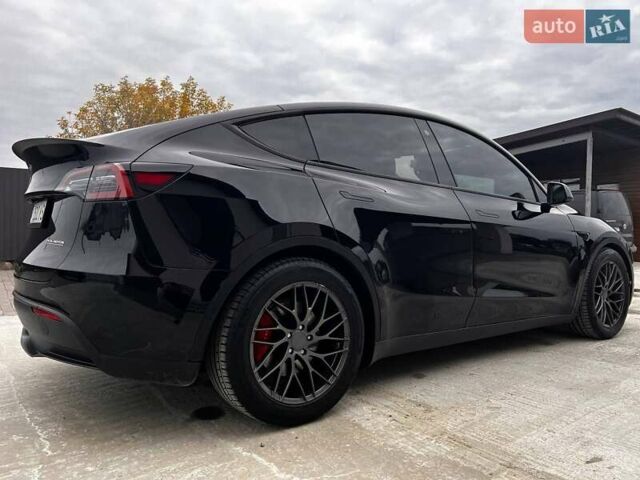 Чорний Тесла Model Y, об'ємом двигуна 0 л та пробігом 73 тис. км за 27999 $, фото 7 на Automoto.ua