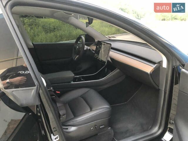 Черный Тесла Model Y, объемом двигателя 0 л и пробегом 63 тыс. км за 27500 $, фото 26 на Automoto.ua