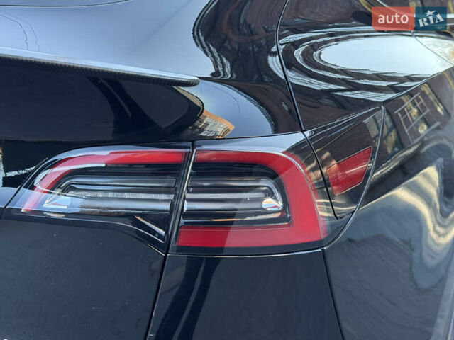 Черный Тесла Model Y, объемом двигателя 0 л и пробегом 68 тыс. км за 28500 $, фото 91 на Automoto.ua