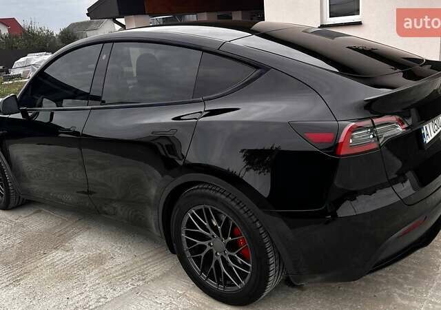 Чорний Тесла Model Y, об'ємом двигуна 0 л та пробігом 73 тис. км за 27999 $, фото 6 на Automoto.ua