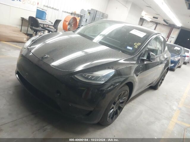 Черный Тесла Model Y, объемом двигателя 0 л и пробегом 114 тыс. км за 20300 $, фото 2 на Automoto.ua