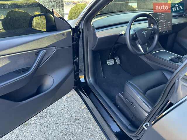 Черный Тесла Model Y, объемом двигателя 0 л и пробегом 60 тыс. км за 22999 $, фото 14 на Automoto.ua