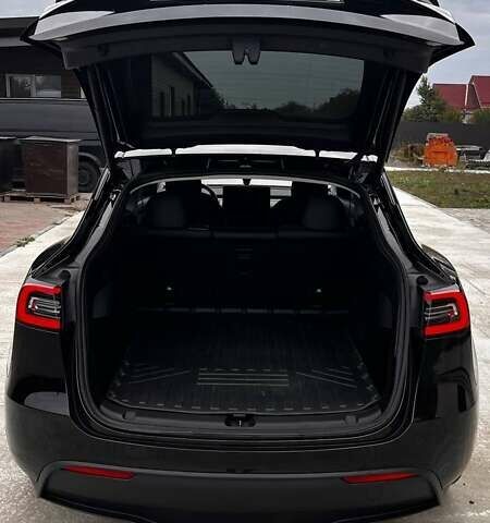 Чорний Тесла Model Y, об'ємом двигуна 0 л та пробігом 73 тис. км за 27999 $, фото 17 на Automoto.ua