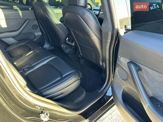 Черный Тесла Model Y, объемом двигателя 0 л и пробегом 60 тыс. км за 22999 $, фото 24 на Automoto.ua