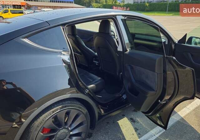 Черный Тесла Model Y, объемом двигателя 0 л и пробегом 99 тыс. км за 27000 $, фото 11 на Automoto.ua