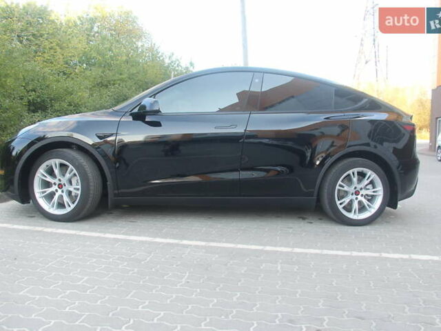 Черный Тесла Model Y, объемом двигателя 0 л и пробегом 56 тыс. км за 27499 $, фото 3 на Automoto.ua