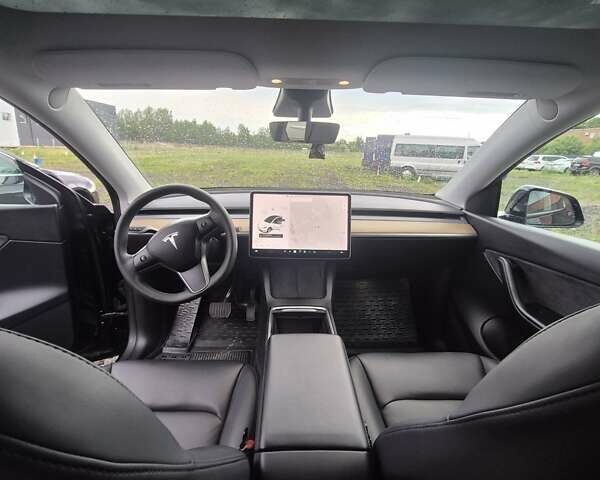 Черный Тесла Model Y, объемом двигателя 0 л и пробегом 104 тыс. км за 23700 $, фото 10 на Automoto.ua
