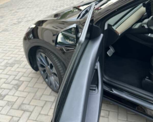 Черный Тесла Model Y, объемом двигателя 0 л и пробегом 58 тыс. км за 27500 $, фото 17 на Automoto.ua