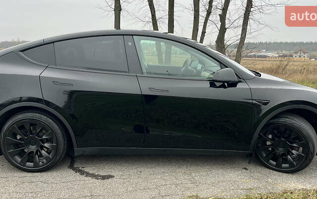 Черный Тесла Model Y, объемом двигателя 0 л и пробегом 97 тыс. км за 19999 $, фото 4 на Automoto.ua