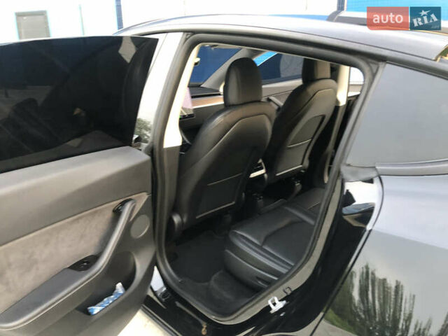 Черный Тесла Model Y, объемом двигателя 0 л и пробегом 63 тыс. км за 27500 $, фото 23 на Automoto.ua