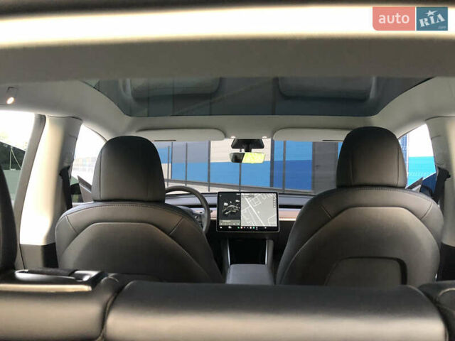 Черный Тесла Model Y, объемом двигателя 0 л и пробегом 63 тыс. км за 27500 $, фото 21 на Automoto.ua