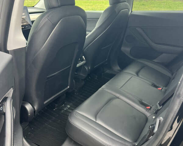 Черный Тесла Model Y, объемом двигателя 0 л и пробегом 97 тыс. км за 19999 $, фото 8 на Automoto.ua