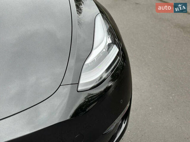 Черный Тесла Model Y, объемом двигателя 0 л и пробегом 82 тыс. км за 26000 $, фото 21 на Automoto.ua