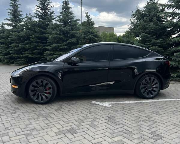 Черный Тесла Model Y, объемом двигателя 0 л и пробегом 58 тыс. км за 27500 $, фото 1 на Automoto.ua