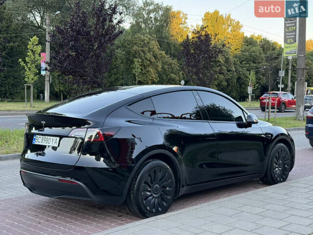 Черный Тесла Model Y, объемом двигателя 0 л и пробегом 102 тыс. км за 24999 $, фото 3 на Automoto.ua